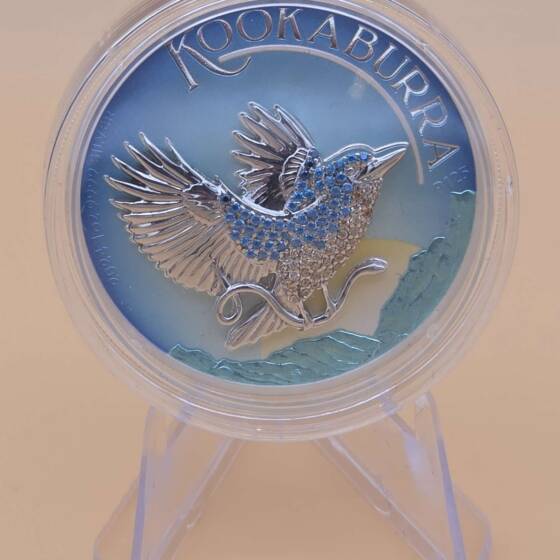 1 oz Silbermünze „Kookaburra 2024“ aus Australien mit Bejeweled Insert und Spezifikationskarte.
